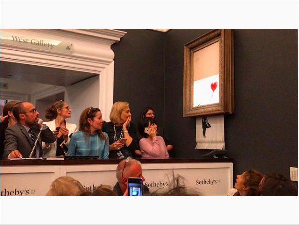 Banksy Artwork Shreds Itself After Selling For $1.4 Million