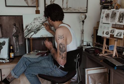 A guy painting as a hobby