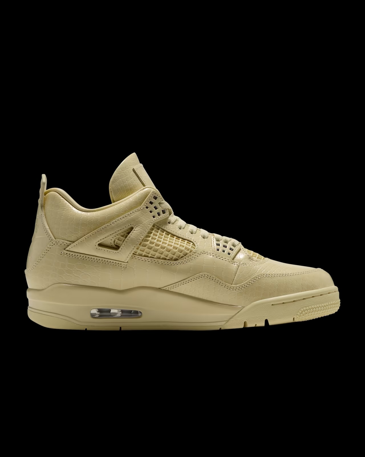 Air Jordan 4 x J Balvin sneaker, angled side view on black background