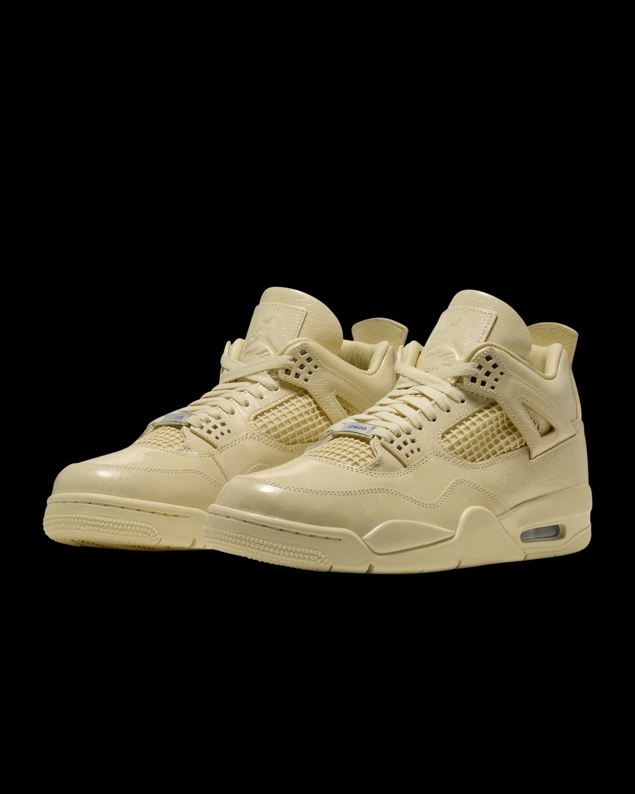 Air Jordan 4 x J Balvin sneaker, side profile product shot on black background