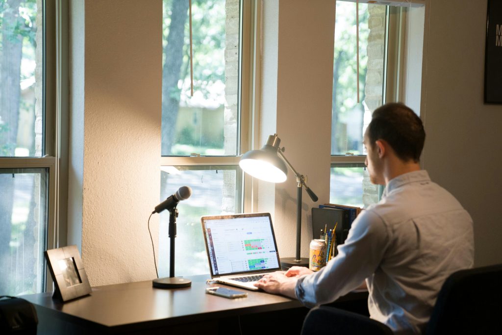 Freelancer working on a side hustle from a home office