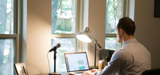 Freelancer working on a side hustle from a home office